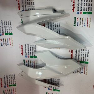 قاب فلاپ بغل کنسول بلوری چراغ جلو موتور آپاچی 150 160 180 جدید اصلی (جفتی) سفید
